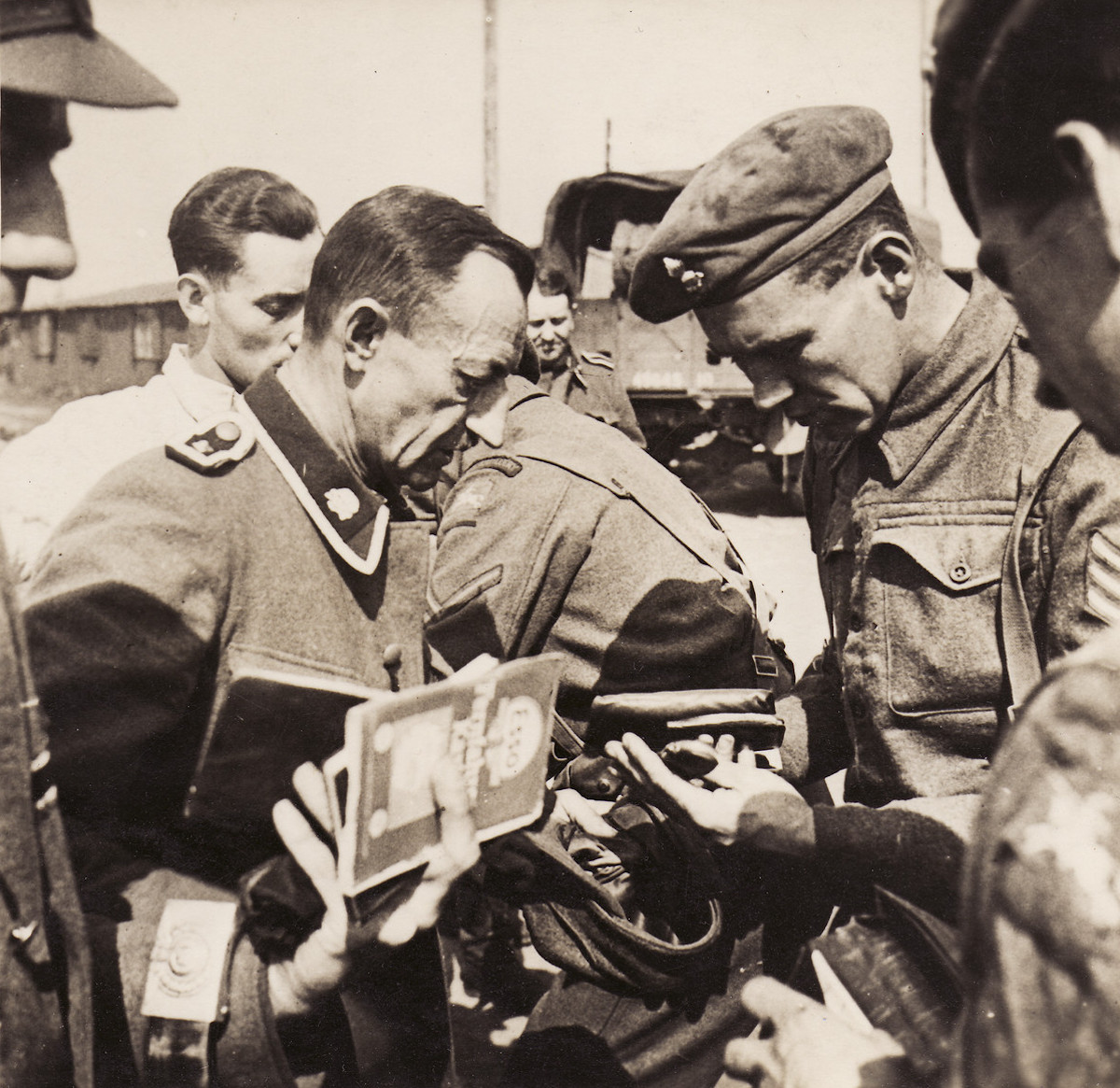 British soldiers inspect the documents of former SS guards at Bergen-Belsen concentration camp, 15 April 1943. United States Holocaust Memorial Museum. British soldiers inspect the documents of former SS guards at Bergen-Belsen concentration camp, 15 April 1943. United States Holocaust Memorial Museum.
