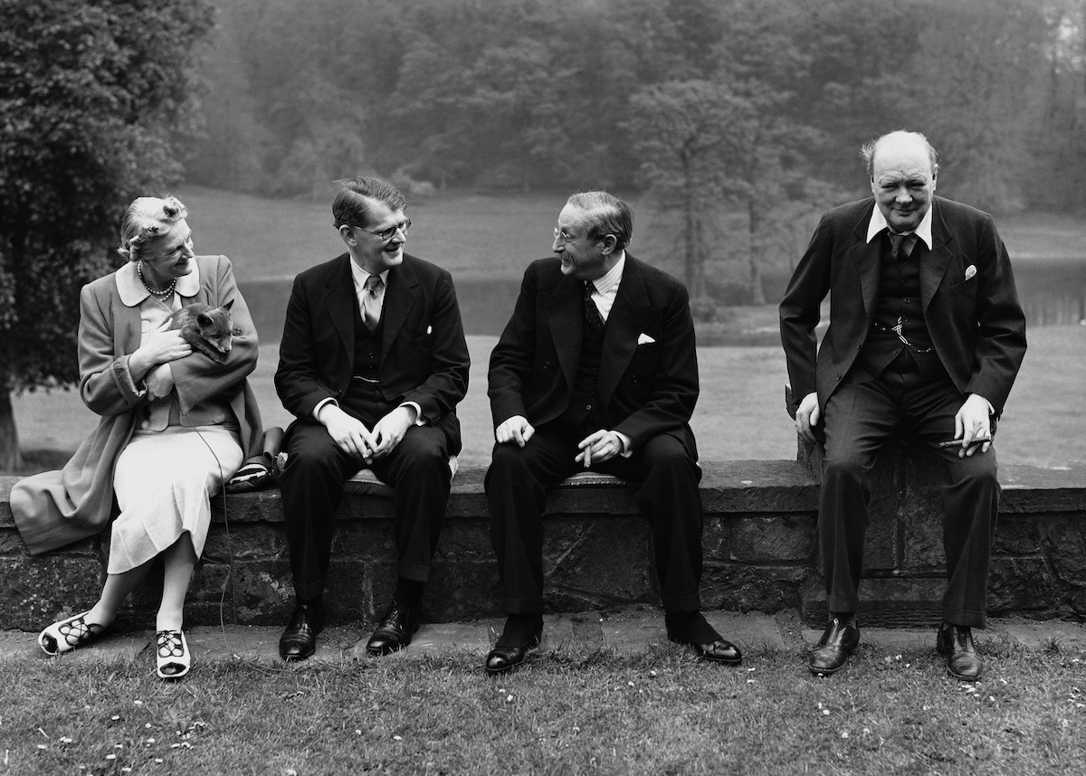 From left to right: Clementine Churchill, Richard Law, Léon Blum and Winston Churchill, Chartwell, 10 May 1939. Associated Press/Alamy Stock Photo. From left to right: Clementine Churchill, Richard Law, Léon Blum and Winston Churchill, Chartwell, 10 May 1939. Associated Press/Alamy Stock Photo.