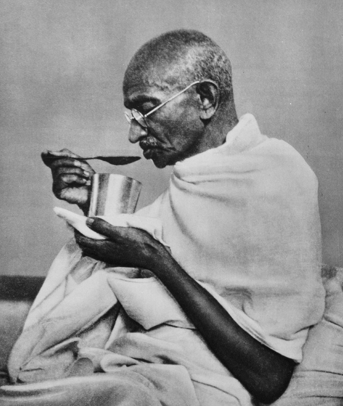 Mahatma Gandhi eats in preparation for a fast, c. 1940. Dutch National Archives (CC0). Mahatma Gandhi eats in preparation for a fast, c. 1940. Dutch National Archives (CC0).